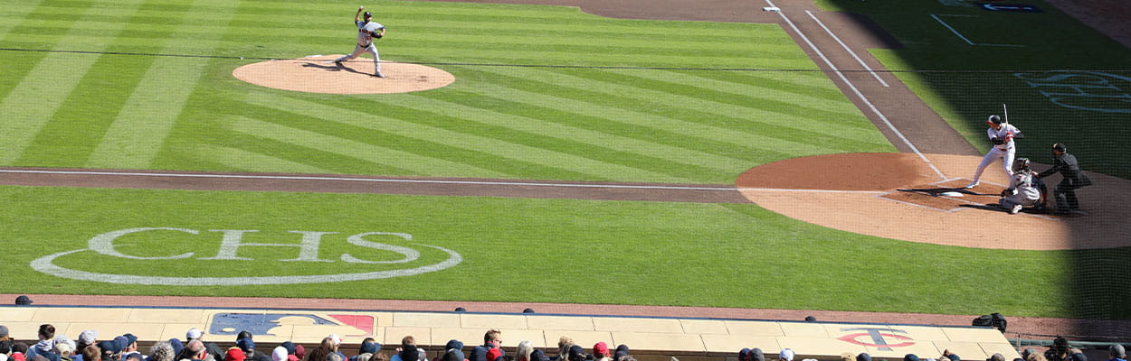 推荐几个靠谱的买球网站 logo on baselines at Minnesota Twins game