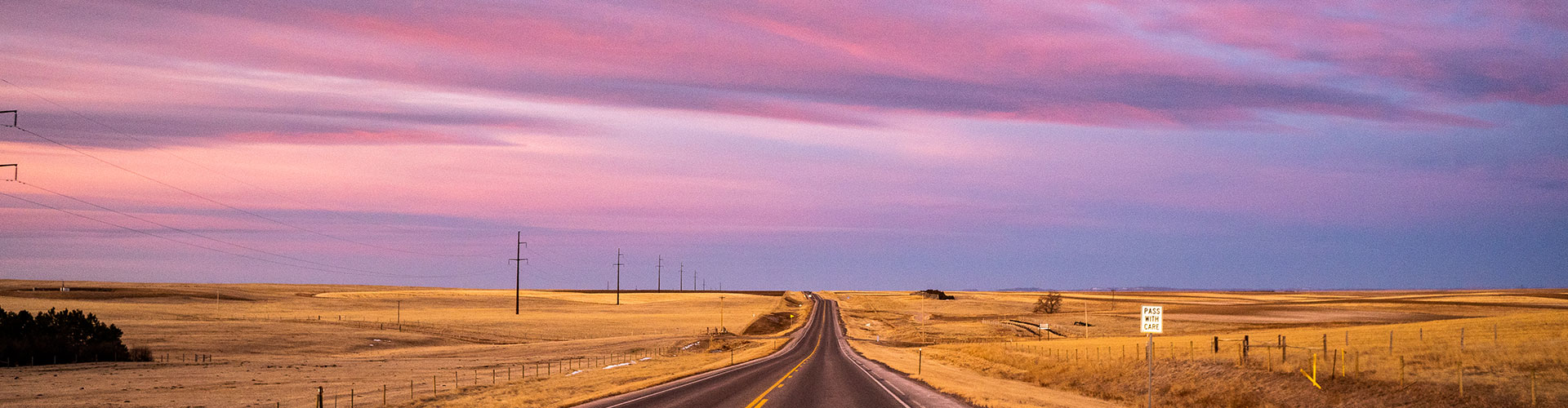 Rural highway at sunset