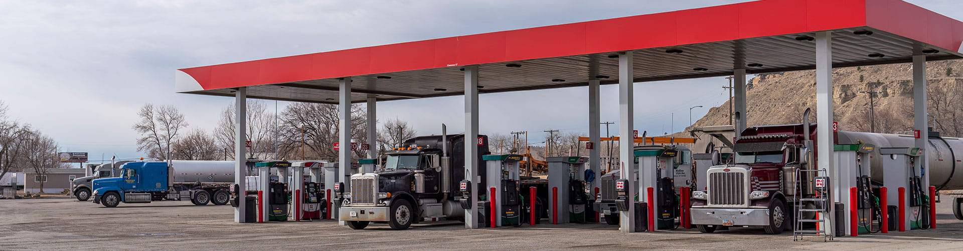 Semi trucks filling up at Cenex diesel gas pumps