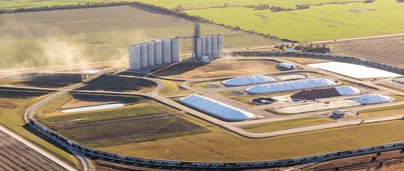 aerial view of an agriculture cooperative location with train