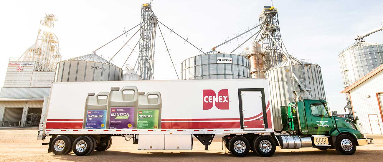 Cenex lubricants branded semi in front of grain bins