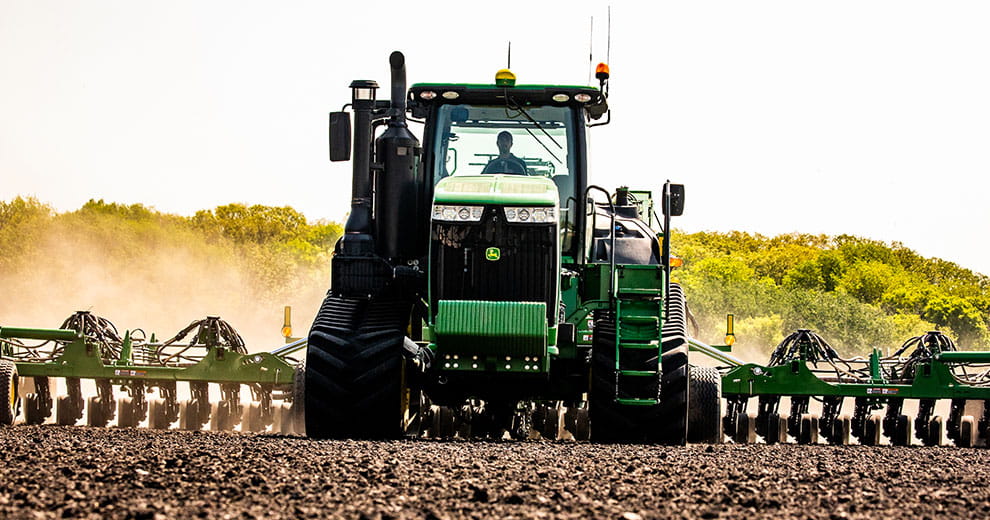 Tractor fertilizing field
