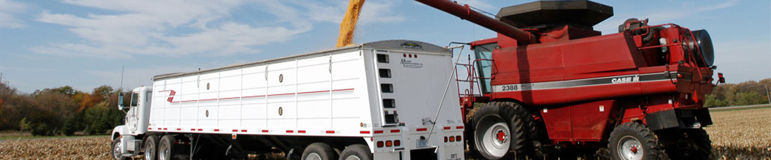 Combine filling bed of semi during harvest