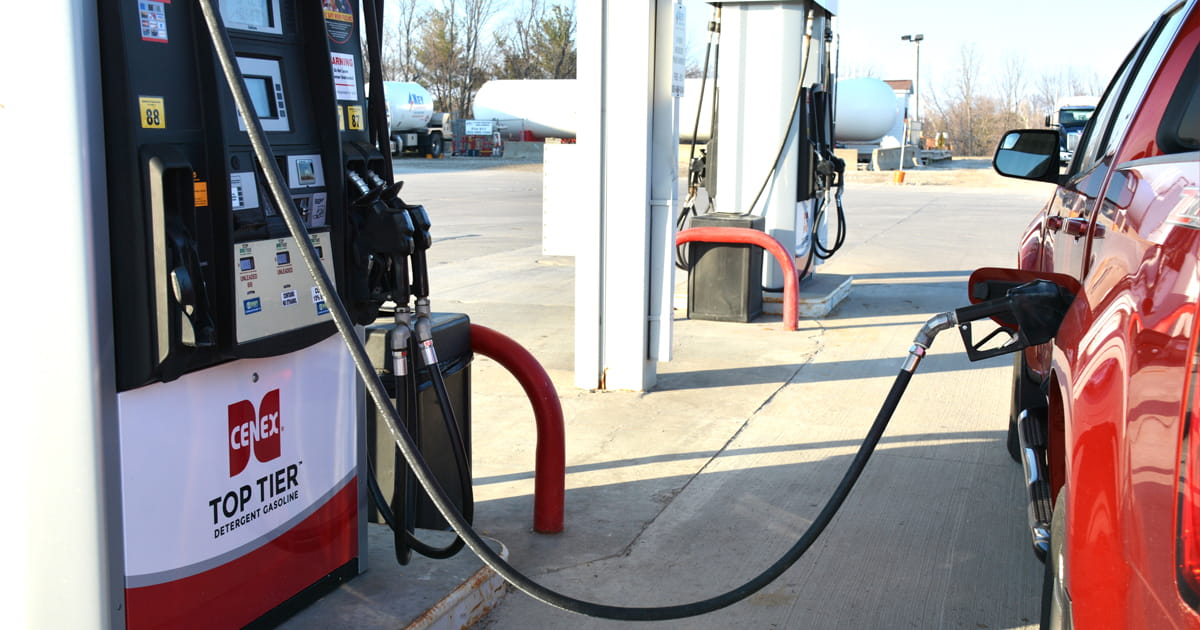 Car filling gas tank at a Cenex Top Tier gas pump