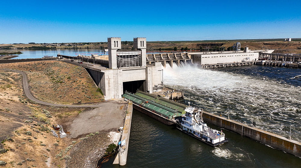 Barge entering a lock at a dam