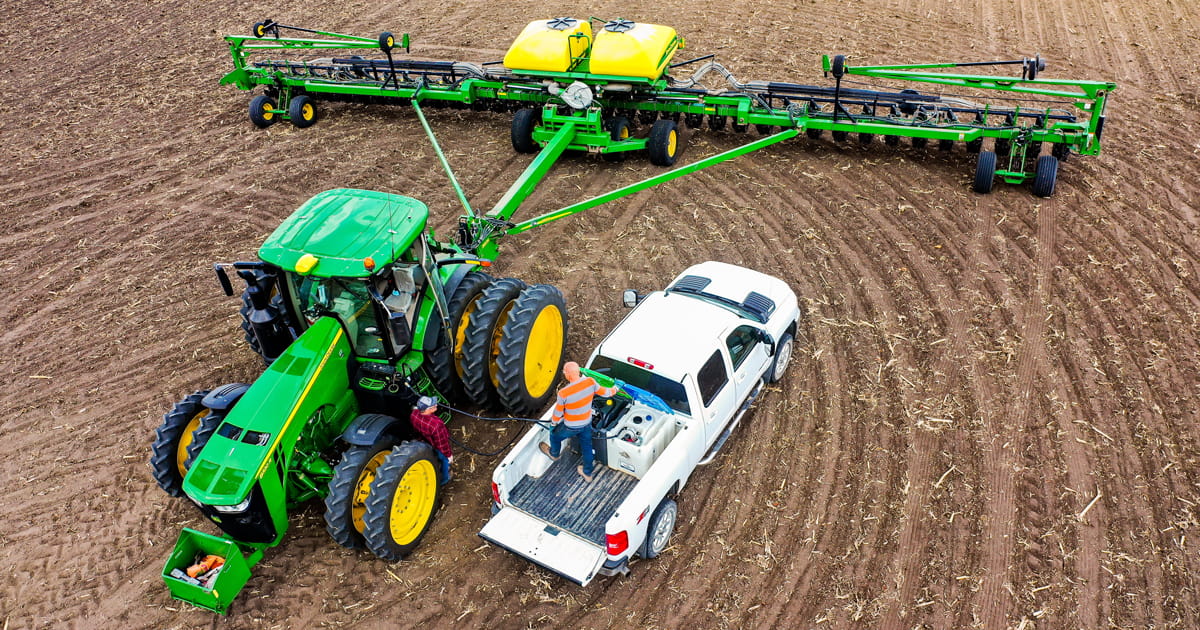 Tractor pulling a planter